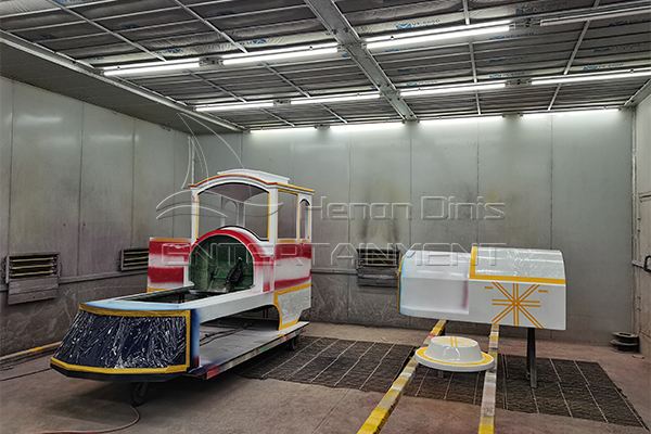 Our Workers Paint Sightseeing Trains in the Clean Room