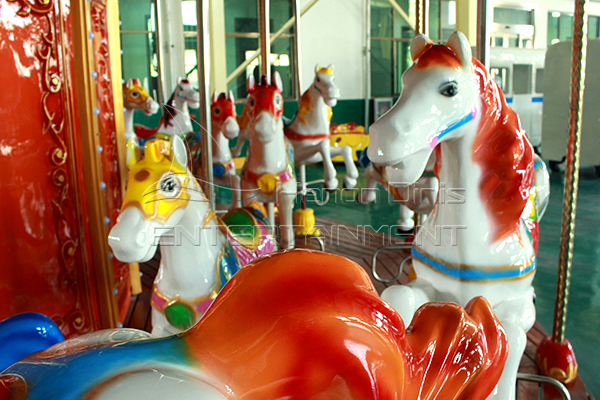 life size carnival spinning horses